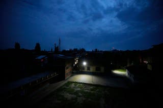 A blackout is seen after residents of the city of Jammu